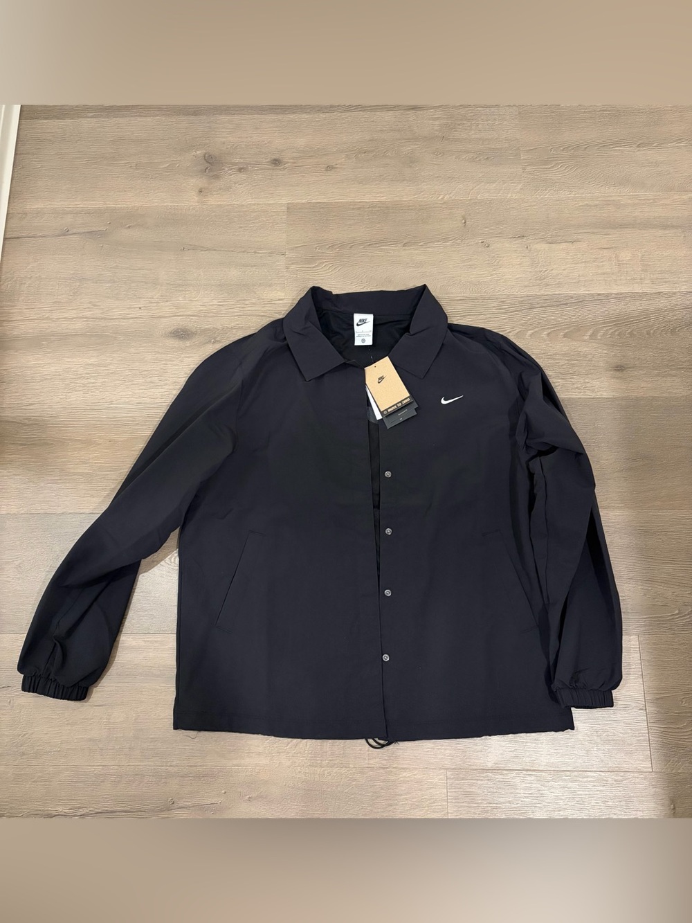 Nike Women’s Black Coach Jacket with Swoosh